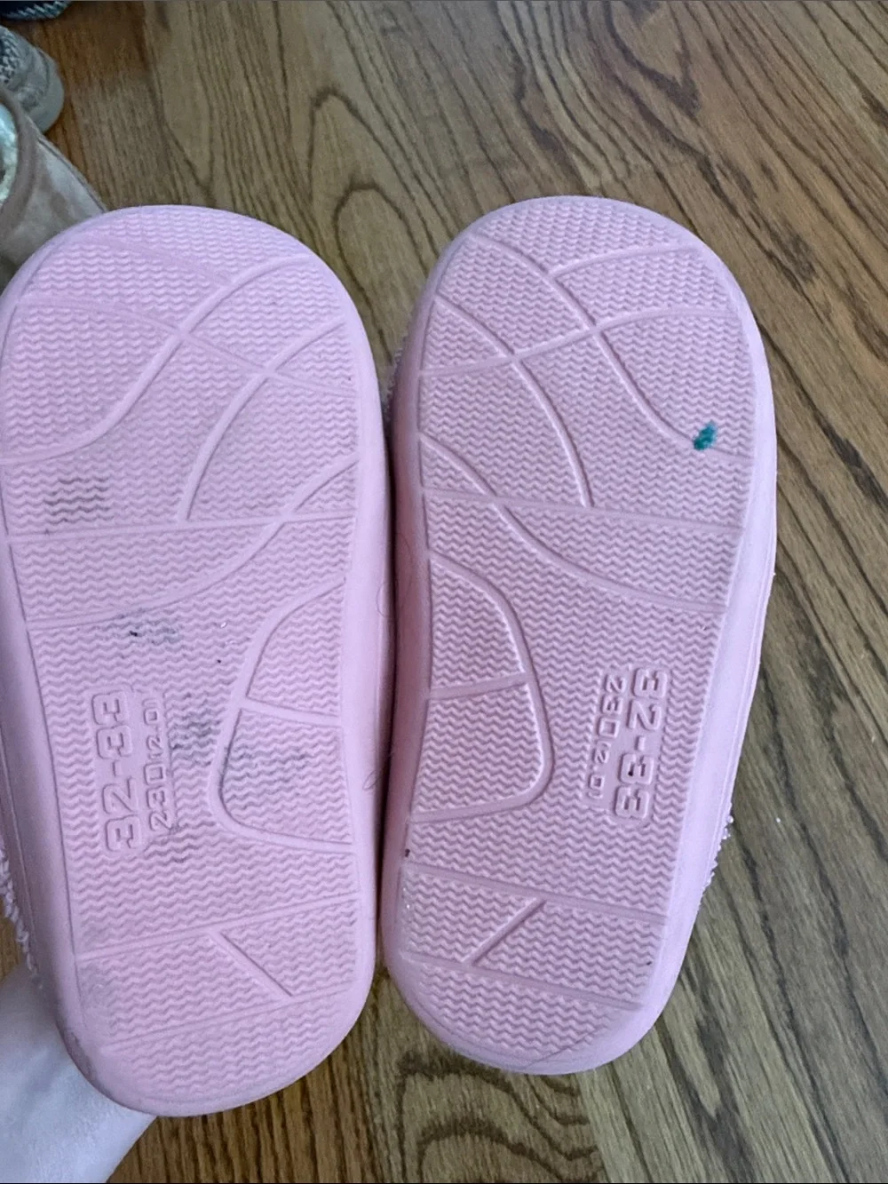Pink Fuzzy Slip-On Slippers with Yellow Smiley Faces